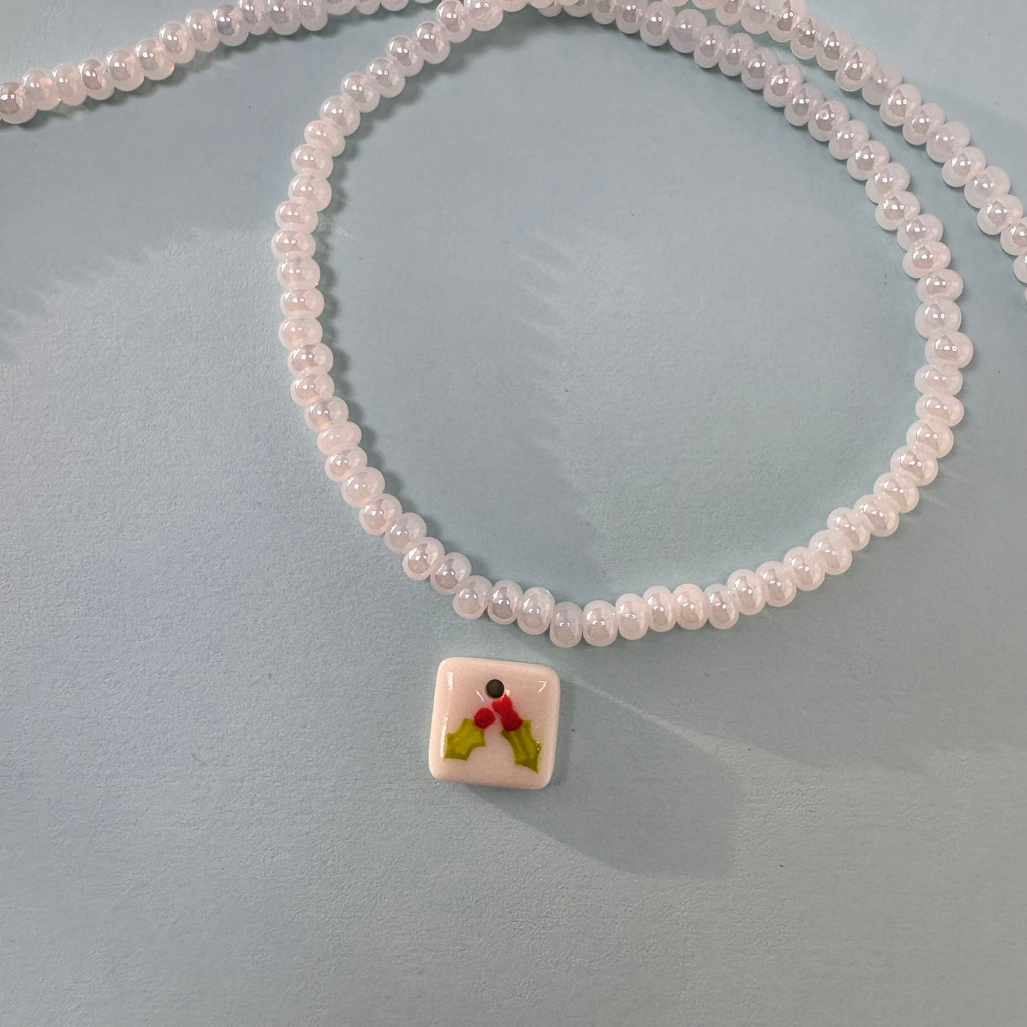 holly charm necklace